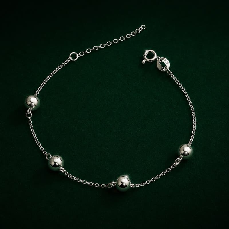 Pulseira Prata 925 com Quatro Bolas Lisas Feminina e Sofisticada